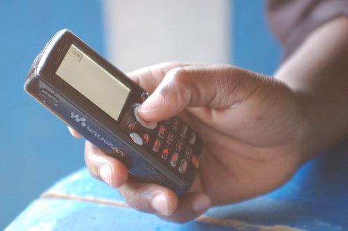 Hand Holding a Mobile Phone