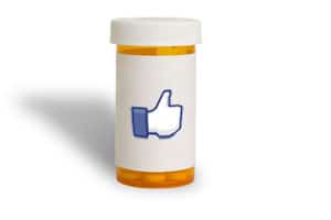 A drug bottle with a 'like' option on the label