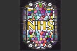 Stained glass window spelling NHS