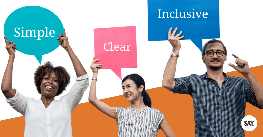 people hold signs with speech bubbles