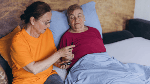 Carer with patient | The invisible influence on trial retention: why caregivers must be part of the plan