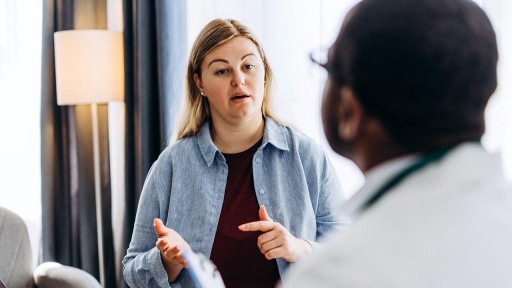 Patient speaking to doctor